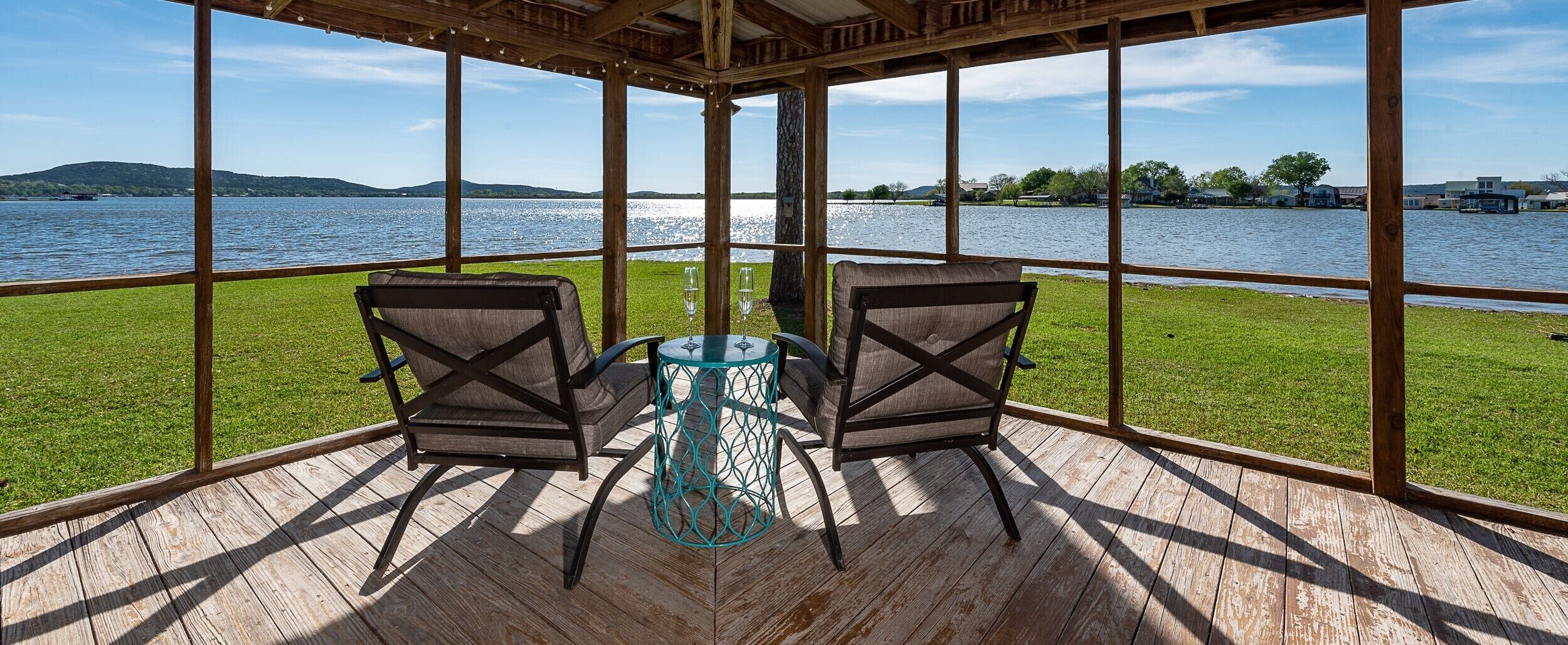 Sip your favorite drink and enjoy the lake and mountain views.