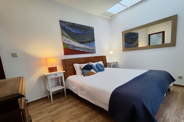 Bedroom with King size bed.