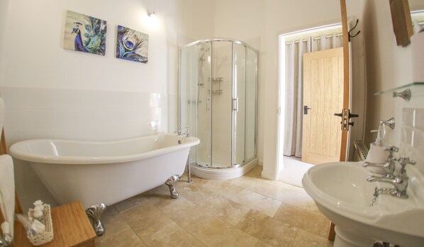 Bathtub, hair dryer, towels