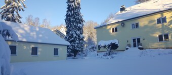 Apartment near the forest with a large garden with playground and fire pit