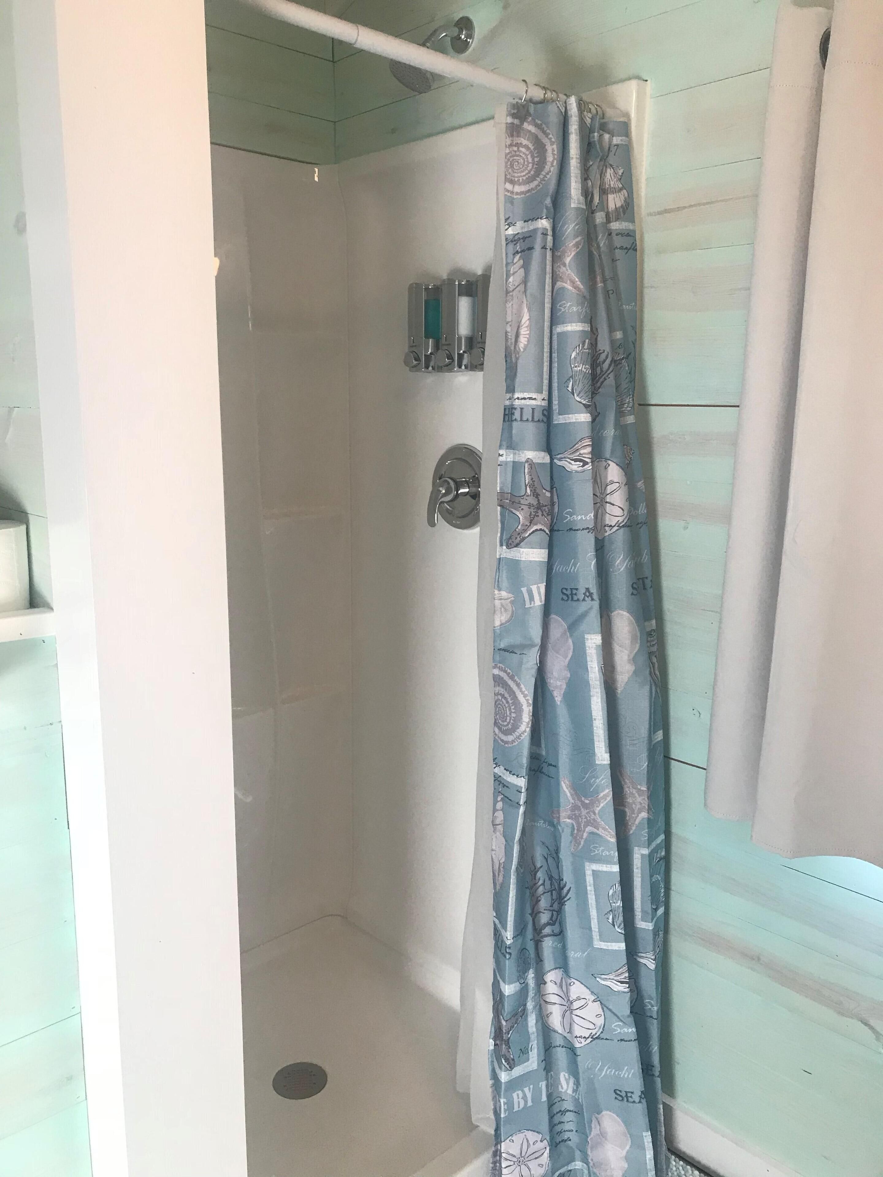 Hair dryer, towels, soap, shampoo