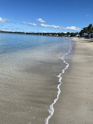 On the beach, sun-loungers, beach towels