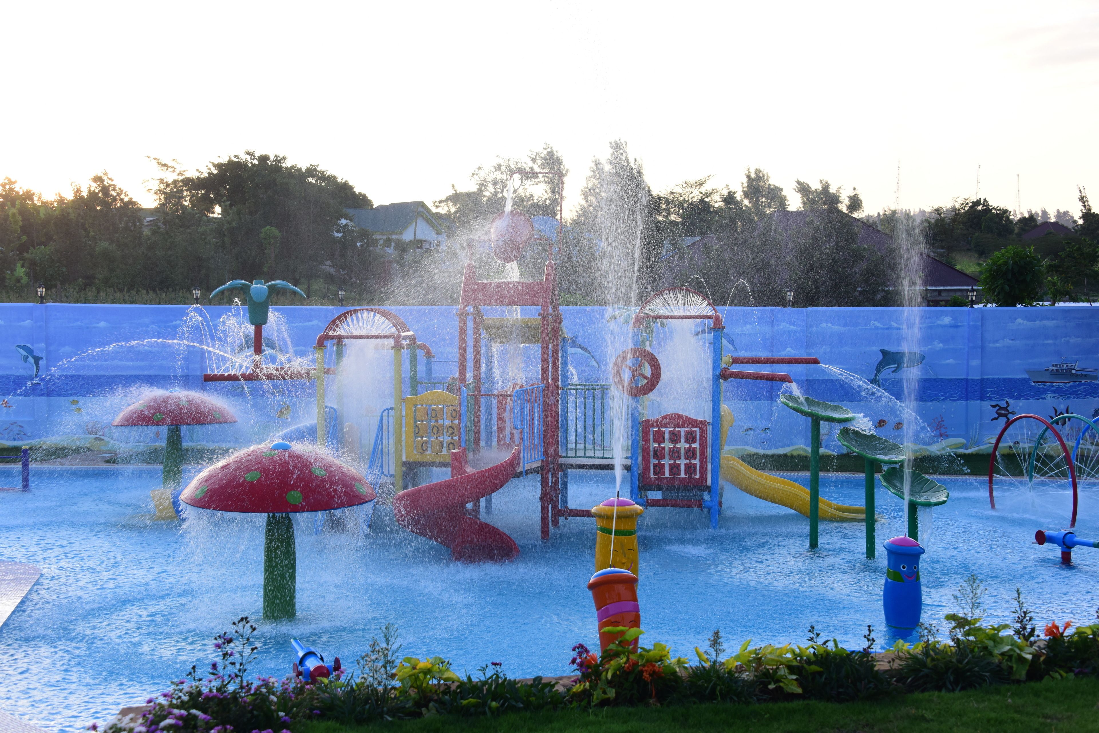 A water play area with various structures and water jets.