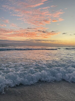 On the beach, sun-loungers, beach towels