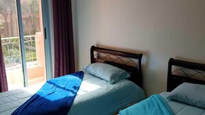 Elite Apartment, 2 Bedrooms, Non Smoking | 2 bedrooms, down duvets, blackout curtains, cots/infant beds - Résidence Mannis la Perla de Marrakech (Marrakech)