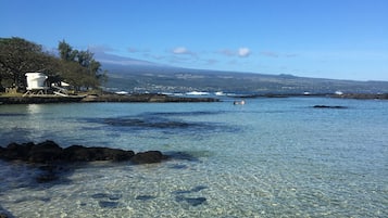 On the beach, sun-loungers, beach towels