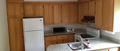 Microwave, coffee/tea maker, cookware/dishes/utensils