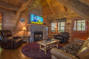Flat-screen TV, fireplace, video games, DVD player