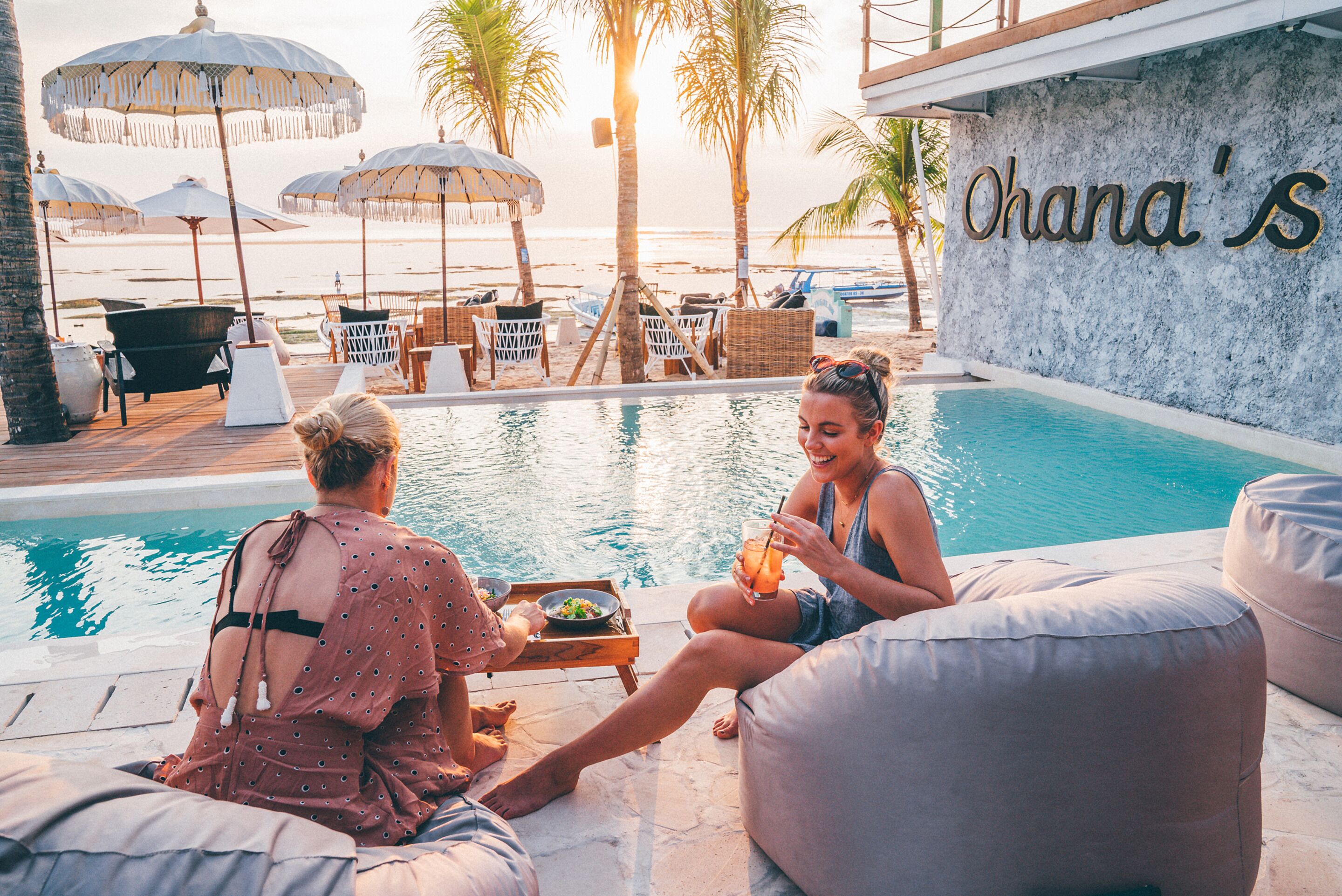 A poolside area with a sign reading "Ohana's".