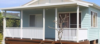 Cute 3 bedroom cottage a short stroll to the beaches, creek and club....
