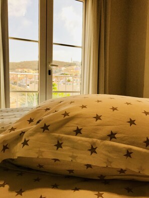 2 bedrooms, blackout drapes, iron/ironing board, free cribs/infant beds