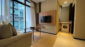 One Bedroom Premier with Balcony | Living area | 40-inch LED TV with cable channels, TV