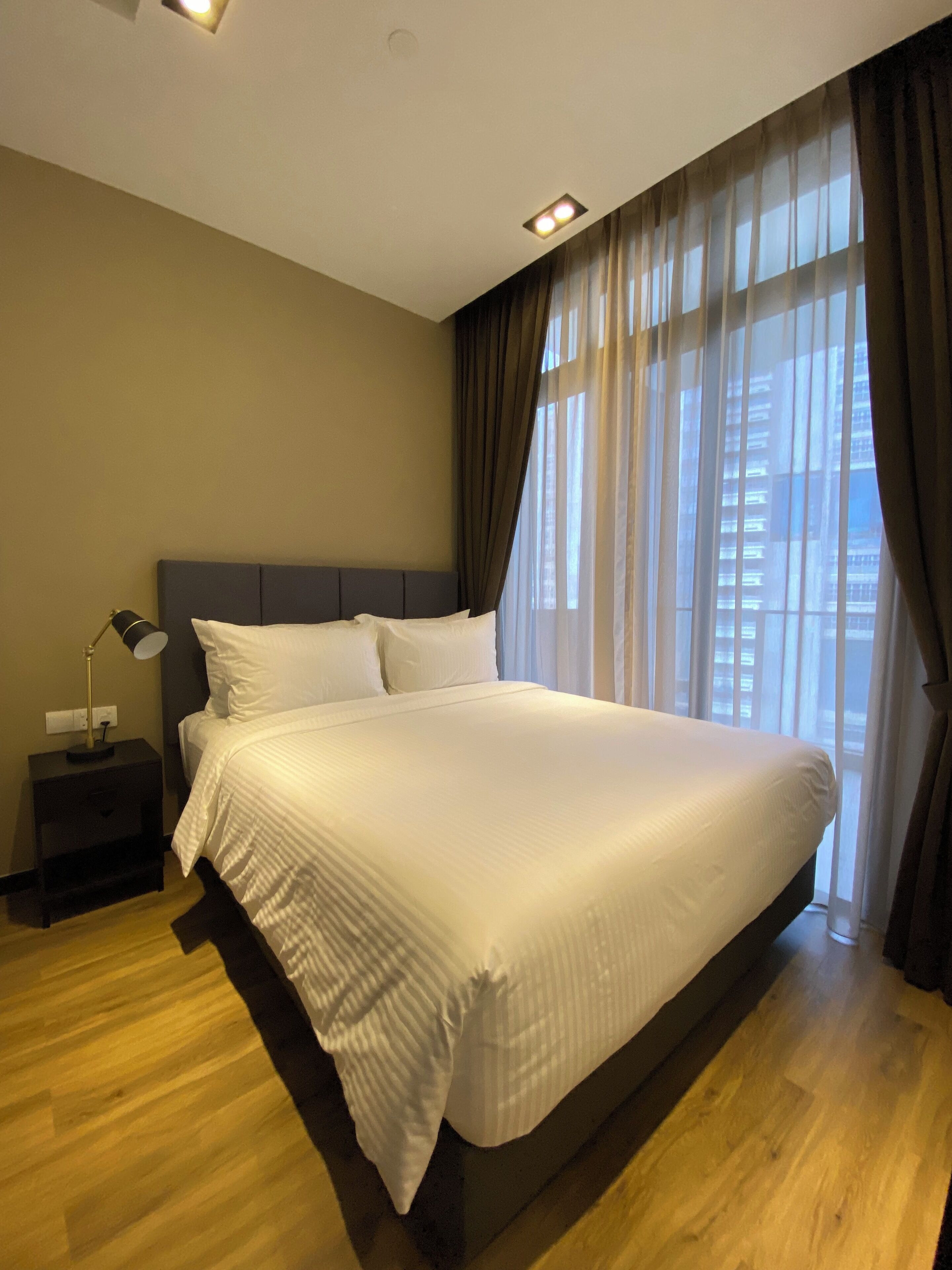 One Bedroom Premier with Balcony | Premium bedding, soundproofing, free WiFi, bed sheets