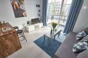 Apartment | Living area | Flat-screen TV - M&R Apartament Mokka Konstruktorska (Warsaw)