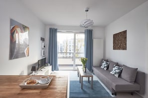 Apartment | Living area | Flat-screen TV - M&R Apartament Mokka Konstruktorska (Warsaw)