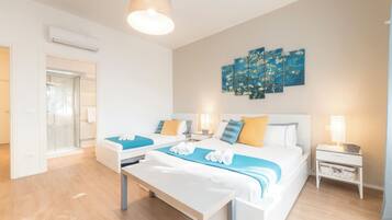 Premium bedding, down duvets, minibar, iron/ironing board