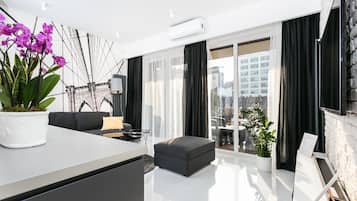 Departamento Deluxe | Sala de estar | Televisión de pantalla plana y Netflix