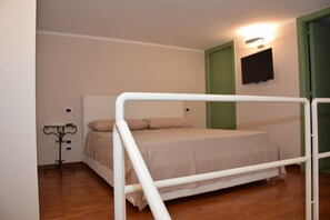 Comfort Apartment, 1 Bedroom | 1 bedroom, desk, iron/ironing board, free cribs/infant beds - La Baia di Napoli (Naples)