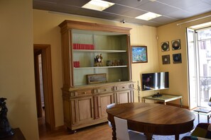 Classic Apartment, 1 Bedroom | Living area | Flat-screen TV - La Baia di Napoli (Naples)