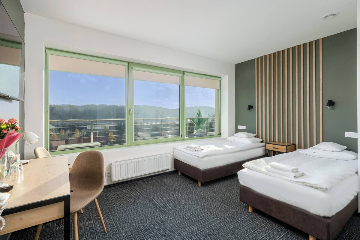Deluxe Double or Twin Room | Desk, blackout drapes, iron/ironing board (on request), WiFi (free)