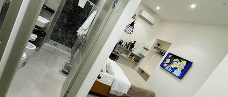 Premium bedding, down comforters, free minibar, in-room safe