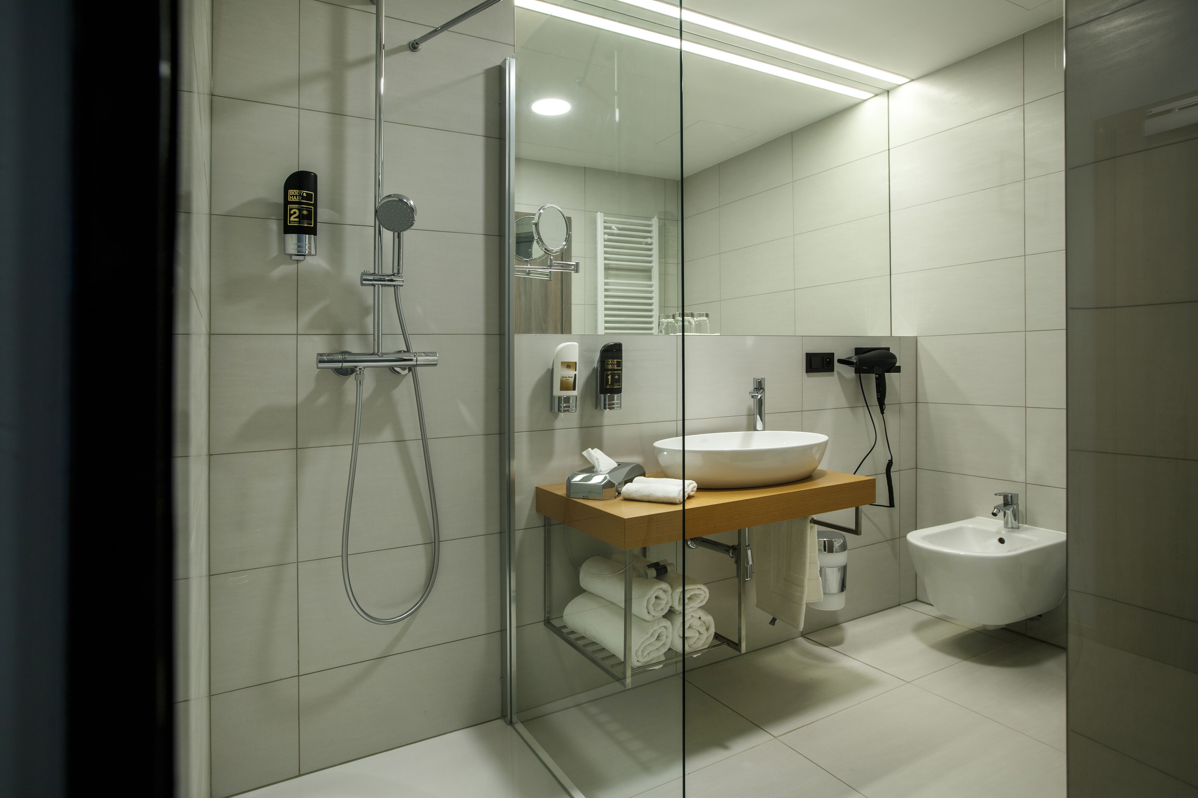 free toiletries, hair dryer, slippers, bidet