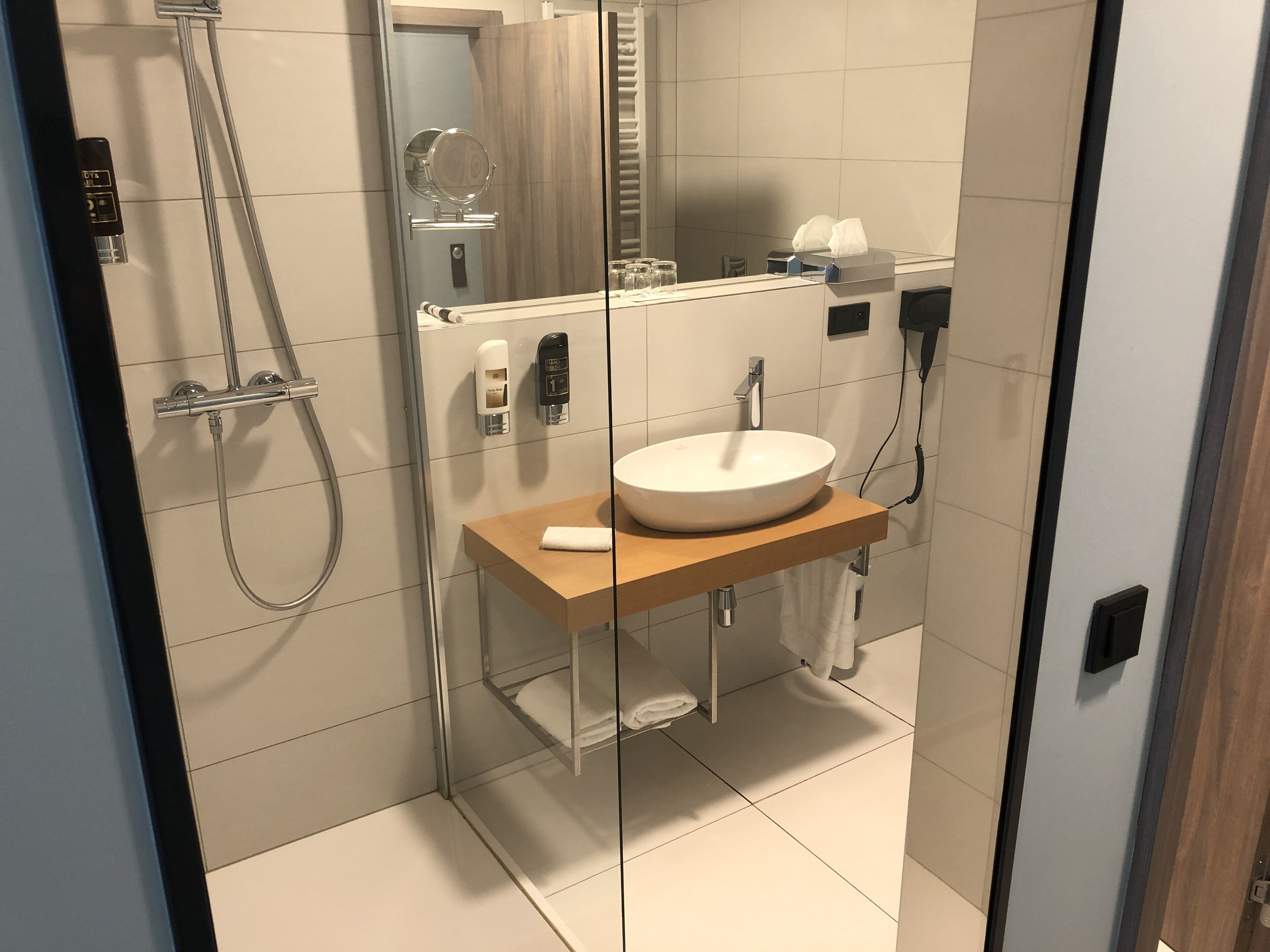 free toiletries, hair dryer, slippers, bidet