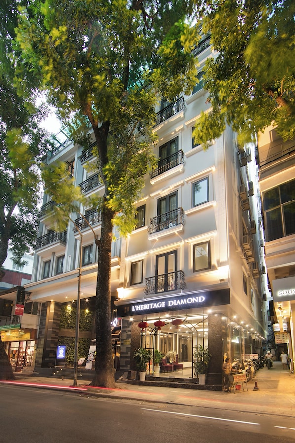 A multi-story hotel with a prominent 'L'Heritage Diamond' sign, large windows, and balconies. - Hanoi L'heritage Diamond Hotel & Spa (Hanoi)