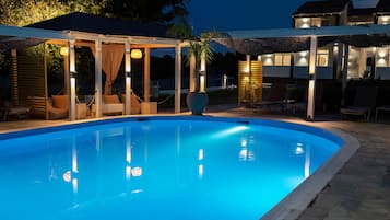 Outdoor pool, open 11:00 AM to 8:30 PM, pool umbrellas, pool loungers