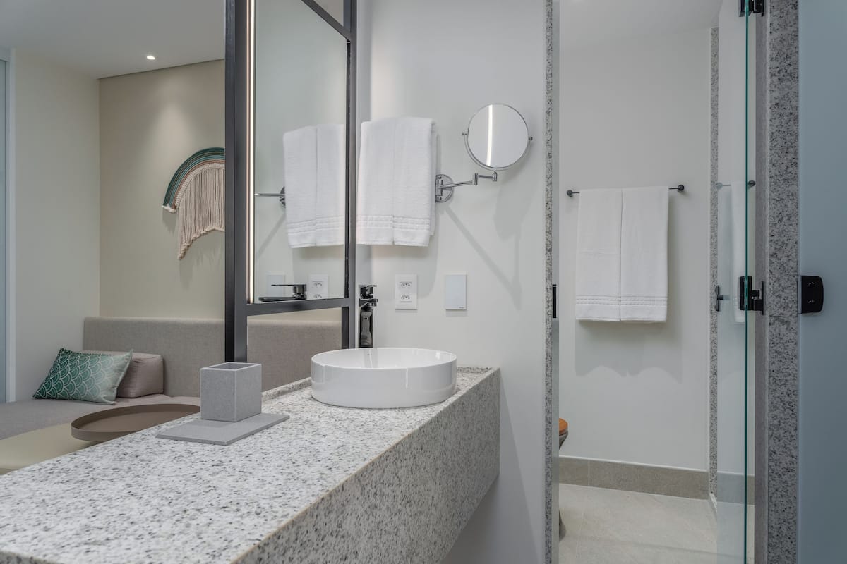 garden suite | bathroom | shower, rainfall showerhead, free toiletries, hair dryer