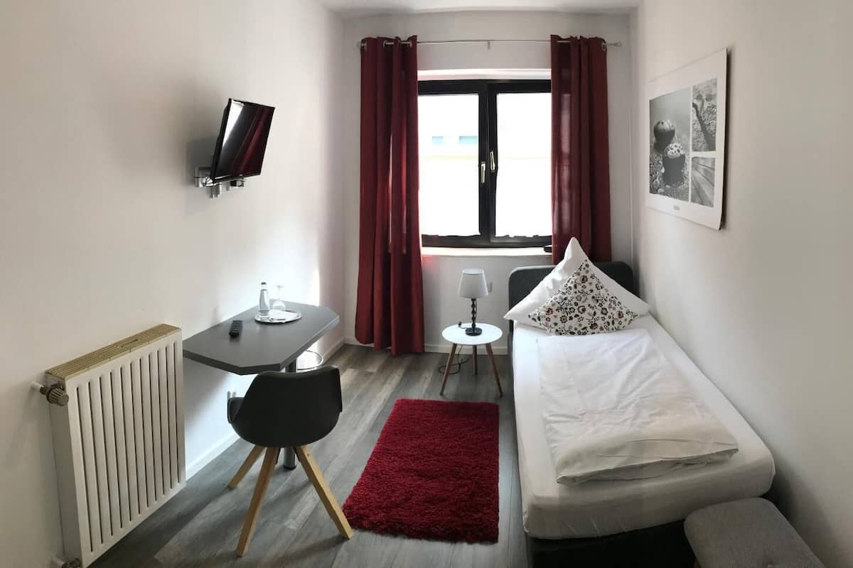 desk, soundproofing, rollaway beds, free wifi