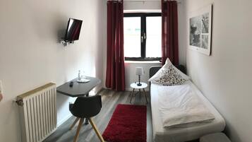 Desk, soundproofing, rollaway beds, free WiFi