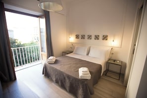 Room 10 - Deluxe Triple | Vue sur la ville