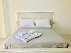 Luxury Suite, Jetted Tub, Sea View | In-room safe, blackout curtains, soundproofing, iron/ironing board - Tiffany's Boutique Suite & Residence (Naples)