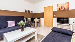 Apartment, 1 Bedroom (HR034-E05) | Living area | TV - Ferienwohnung Eitorf (Eitorf)