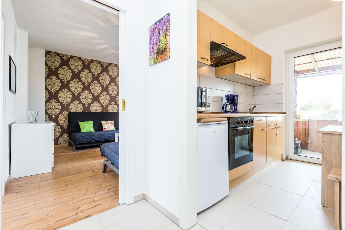 Departamento, 1 habitación (HR090-T08) | Cocina privada | Cafetera y tetera, refrigerador, horno y parrilla de estufa 