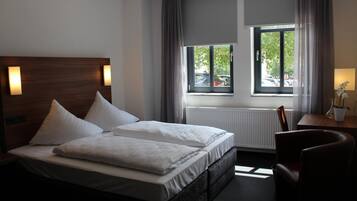 Desk, blackout curtains, soundproofing, cots/infant beds