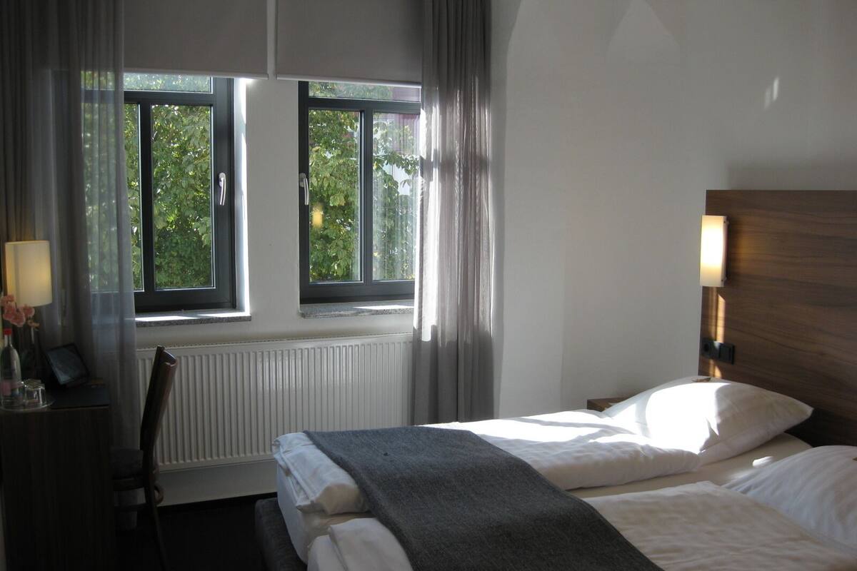 Economy Double Room, 1 Queen Bed, Non Smoking, City View | Desk, blackout curtains, soundproofing, cots/infant beds