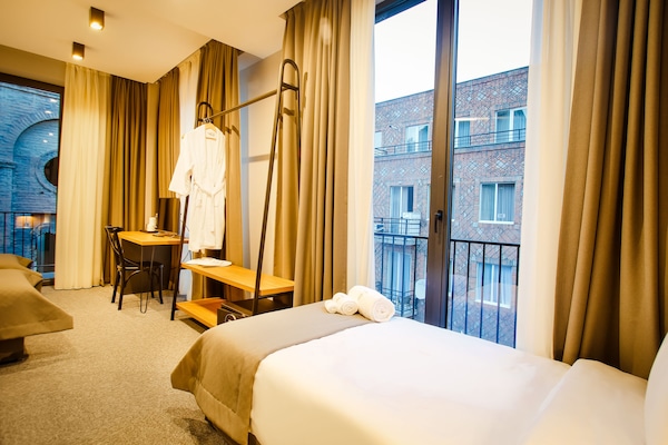 Ropa de cama de alta calidad y minibar