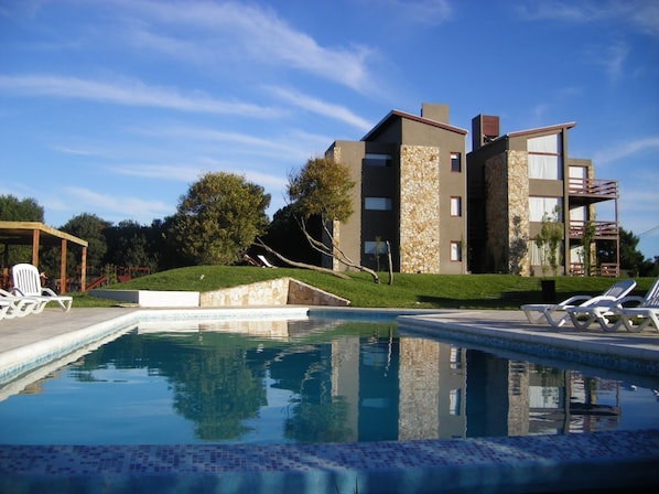 Outdoor pool, pool umbrellas, pool loungers