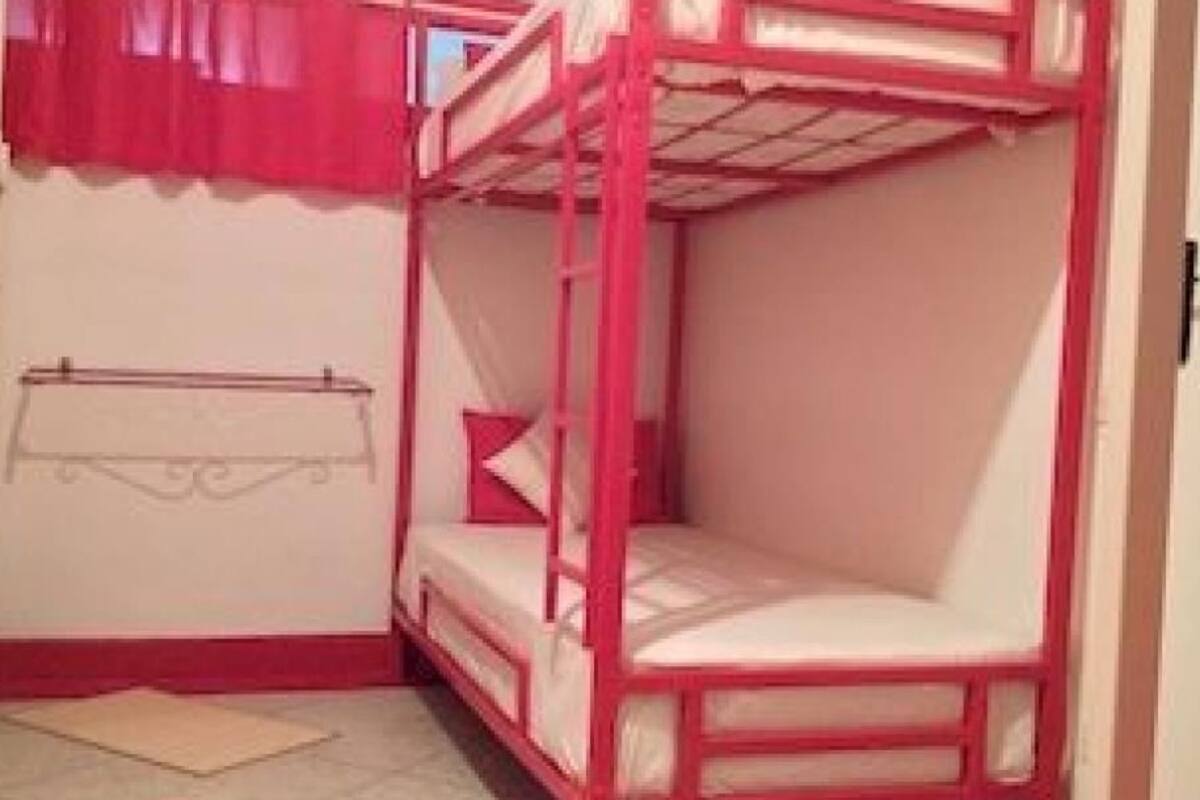 Desk, blackout curtains, iron/ironing board, free cots/infant beds