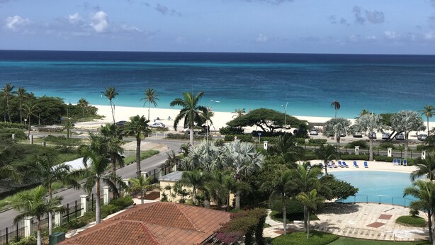 A resort with a pool, beach, and ocean view. - Luxury, Eagle Beach Front 2BR, Penthouse  Private Roof Terrace (Eagle Beach)
