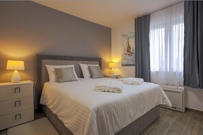 4 habitaciones, tabla de planchar con plancha y internet