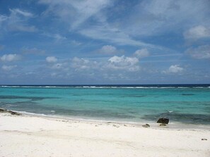 On the beach, sun loungers, beach towels - Sea Paradise # 24 (Cayman Islands)