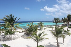 On the beach, sun-loungers, beach towels