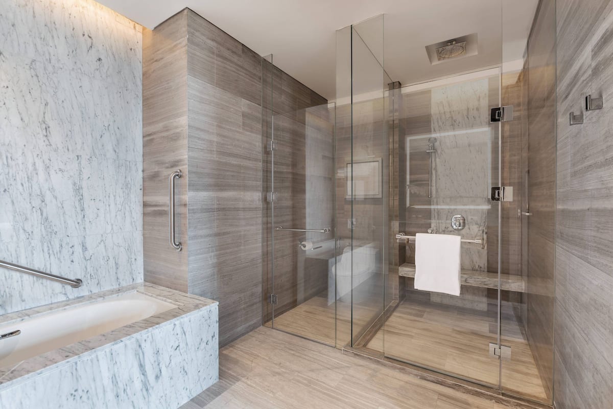 hair dryer, bathrobes, slippers, bidet