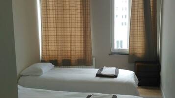 Apartment, Multiple Beds, Non Smoking | Individually furnished, blackout drapes, iron/ironing board, free WiFi