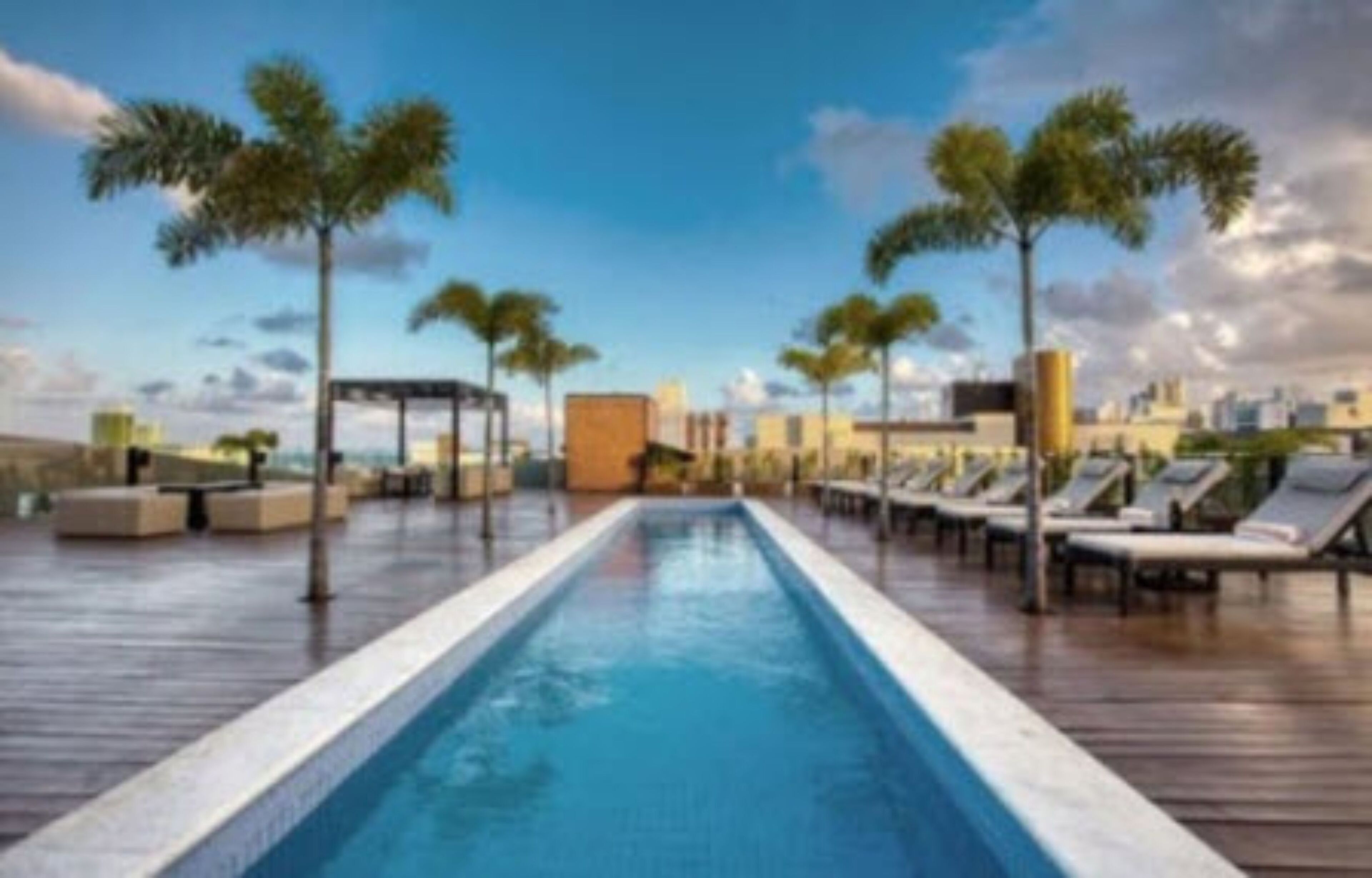 Outdoor pool, open 6:00 AM to 5:00 PM, pool loungers