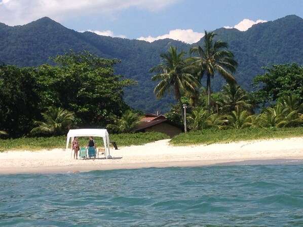 On the beach, sun loungers