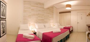 Minibar, tabla de planchar con plancha, wifi gratis y ropa de cama 